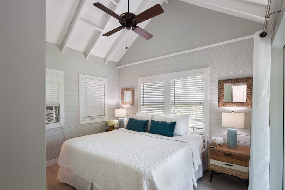 Upstairs king bedroom with vaulted ceiing and mini split A/C.