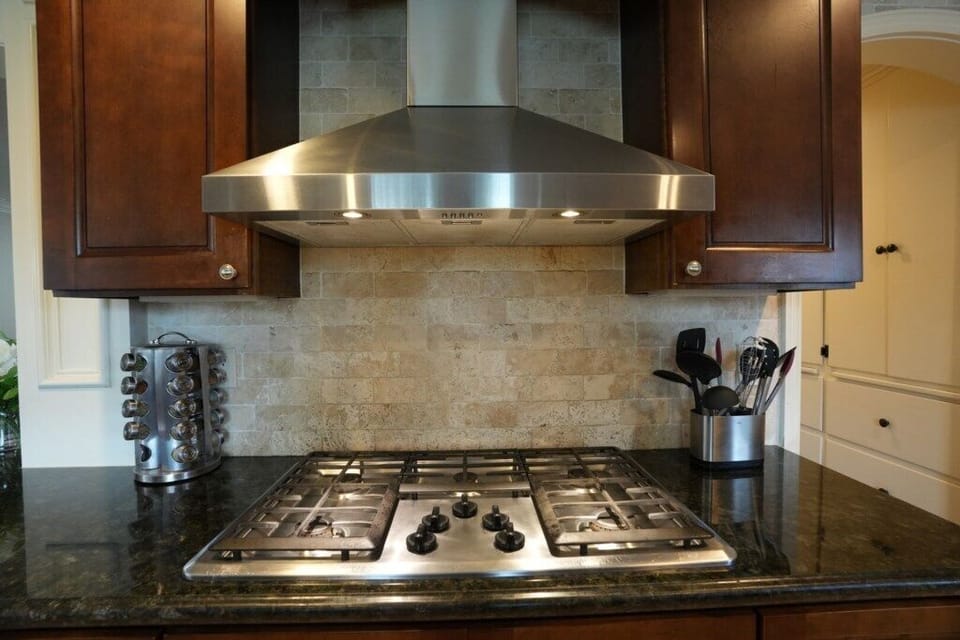 Custom Spacious Kitchen with Stainless Steel Appliances view 3