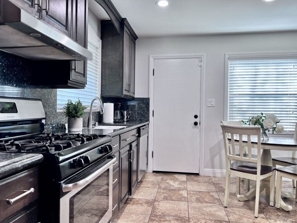 Custom Kitchen with Granite Countertops and Breakfast Nook