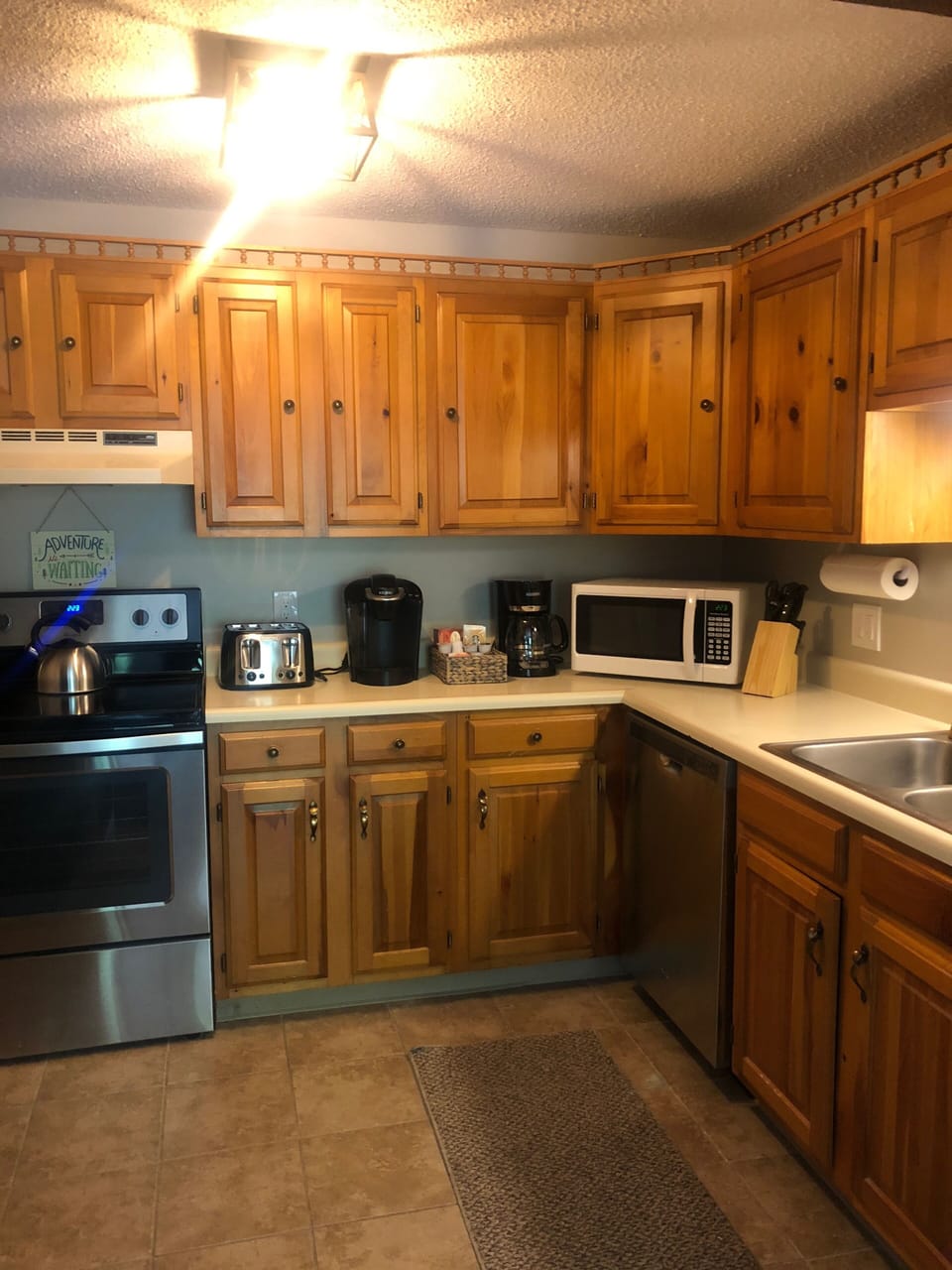 Kitchen entrance from the left loft stairs to the right 