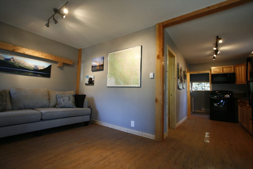 Living room and entrance to kitchen