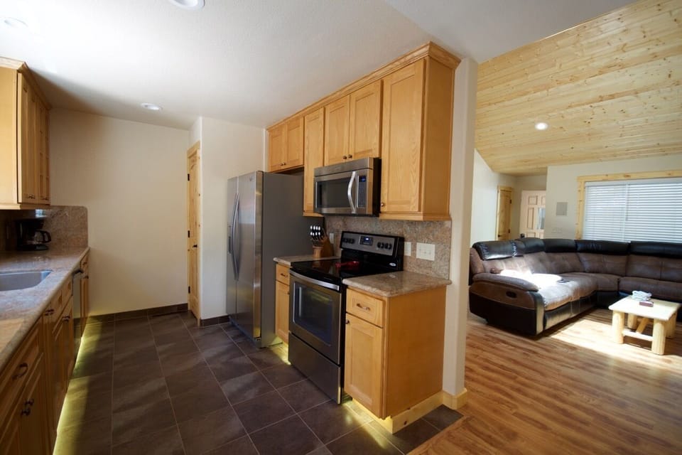 Gourmet Kitchen with Granite & Stainless Appliances