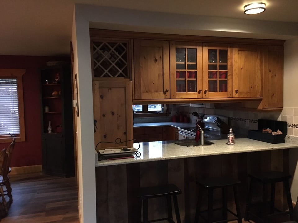 View to fully equipped kitchen
