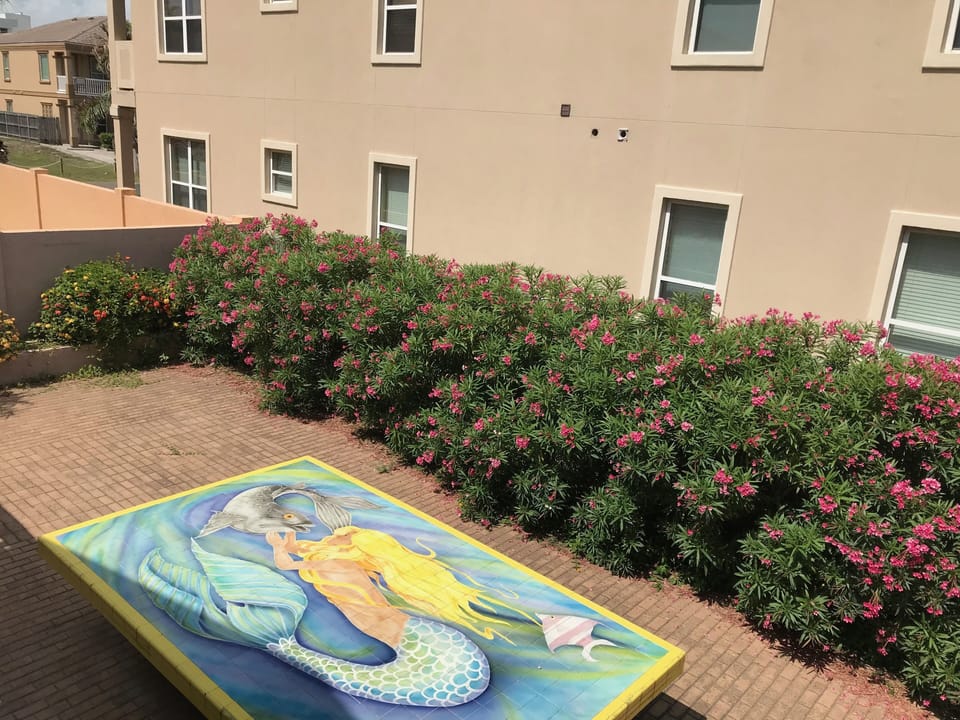Huge Mermaid table is a permanent landmark in our backyard