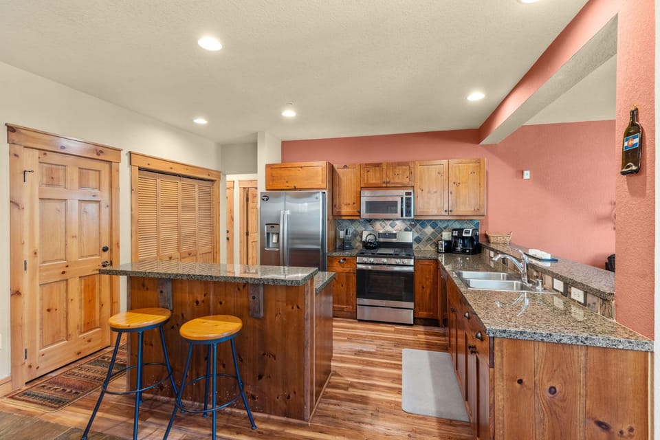 Kitchen bar area with seating for 2.