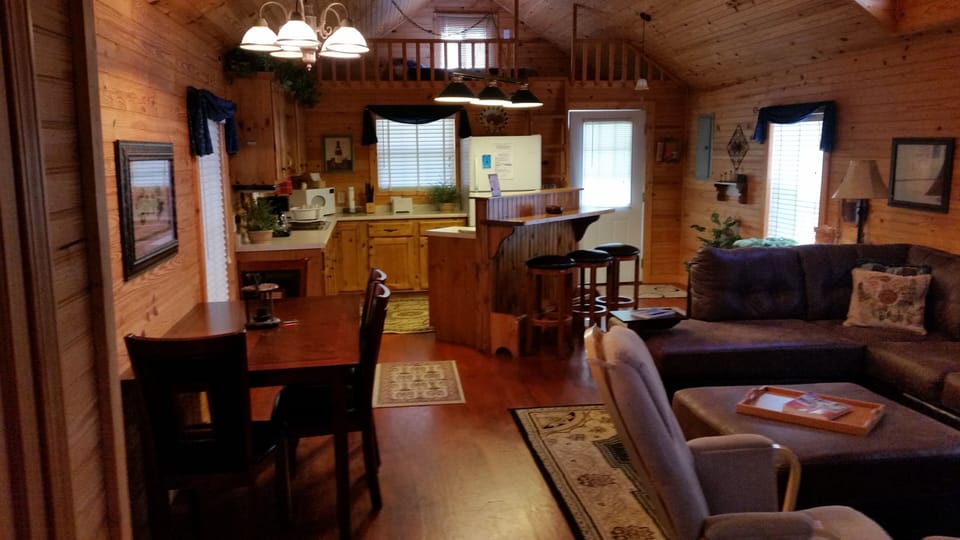 Living room/dining room/kitchen & breakfast bar.  Sleeping loft.