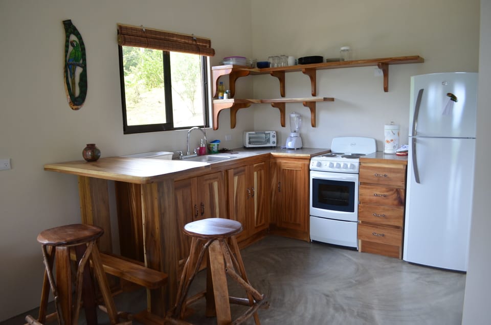Beautiful guanacaste wood is used throughout the home.