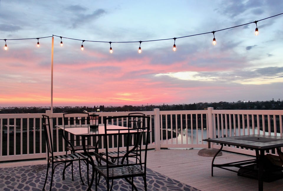 Enjoy the stunning views of the Pacific Ocean from the back deck and fire pit.