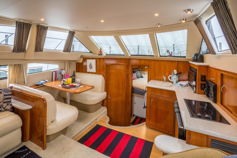 Kitchen area, dinette and forward stateroom, and bath