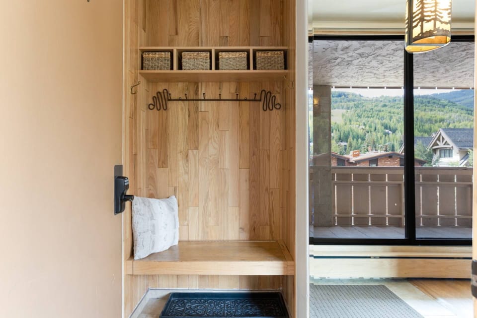 Stay organized with convenient storage in the entryway for all your coats and gear.