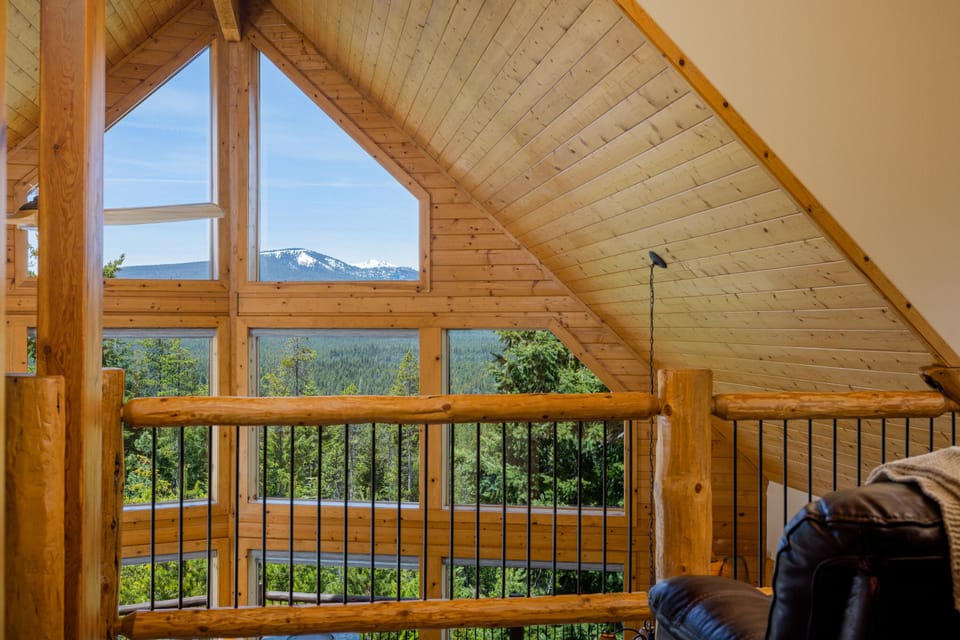 View from loft with big comfy leather chair. Diamond Peaks is in the distance.
