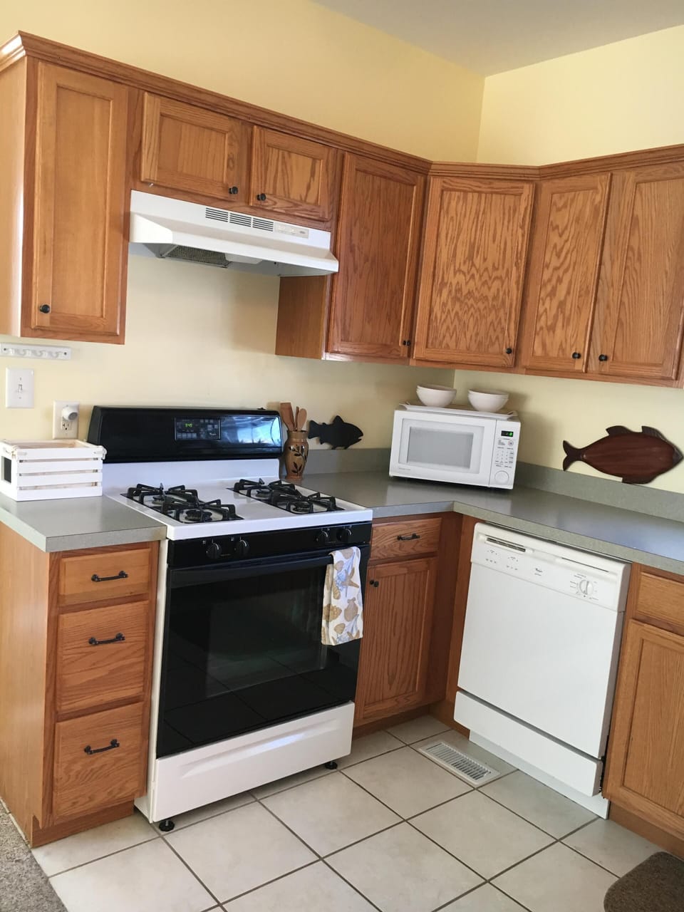 fully stocked kitchen including Keurig coffee pot 