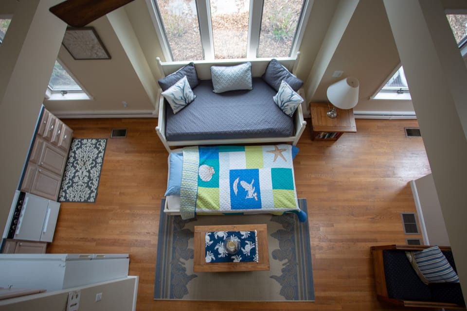 Wake up to the sun in the second living room complete with daybed and trundle