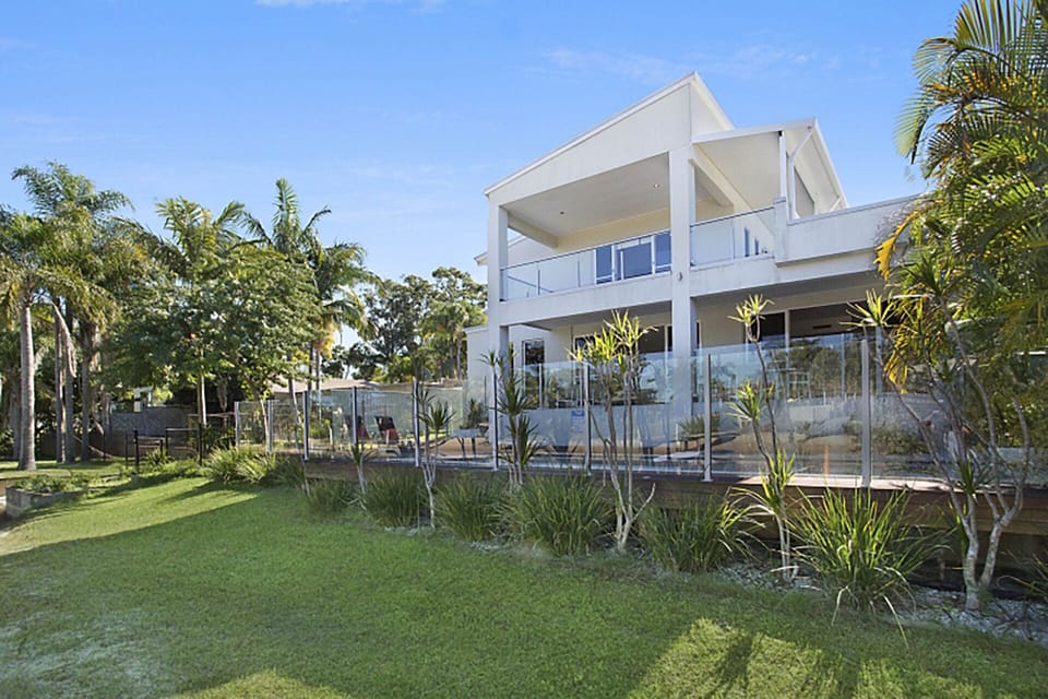 Back of property from open water canal