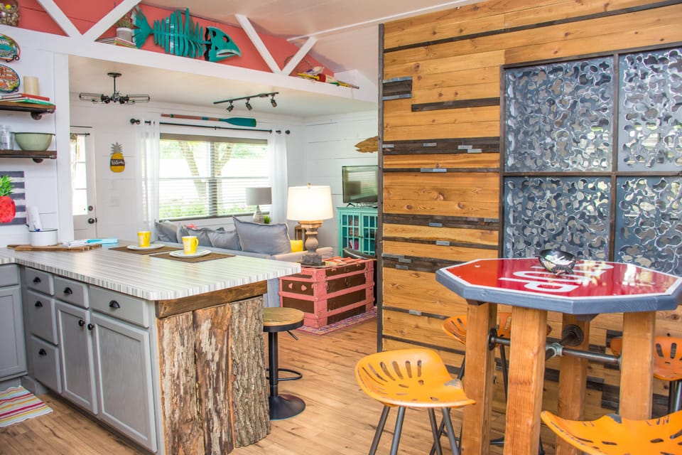 Kitchen, living and privacy wall to bedroom.