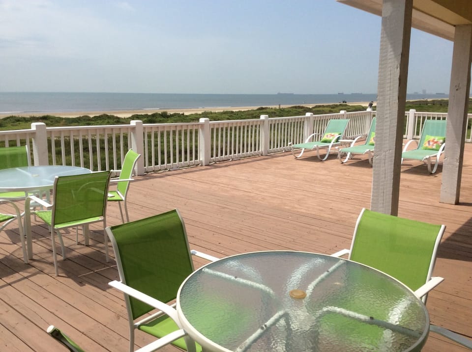 Large deck, plenty of room for all. Lounge chairs, recliners, dining tables