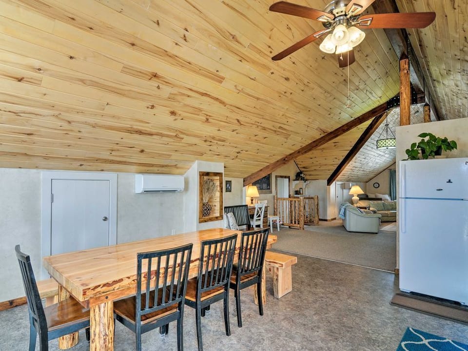 Dining area, featuring hand-crafted table and benches.