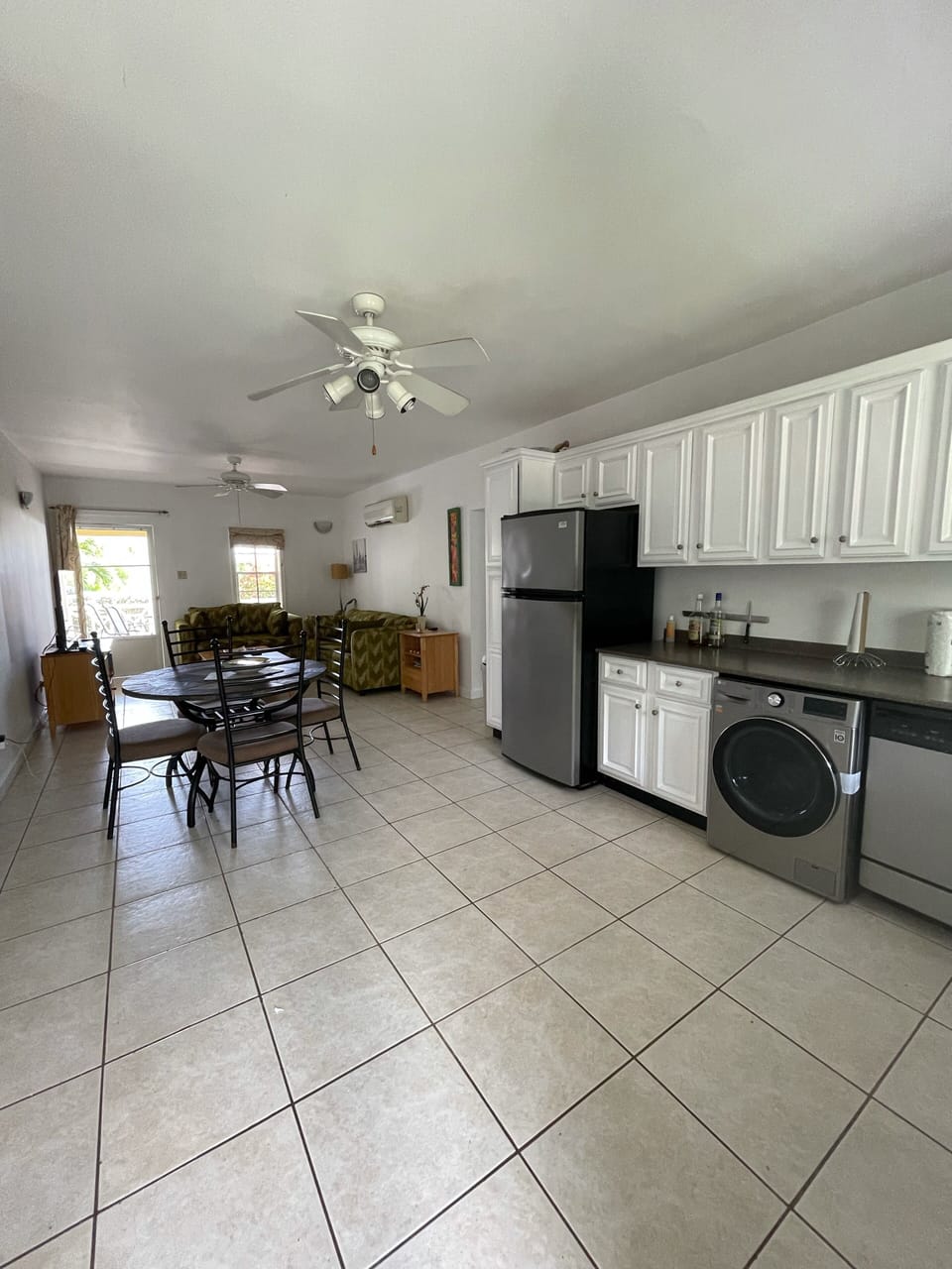 Lounge area includes Sofa bed, Smart Tv, Bluetooth speaker, books, board games. 