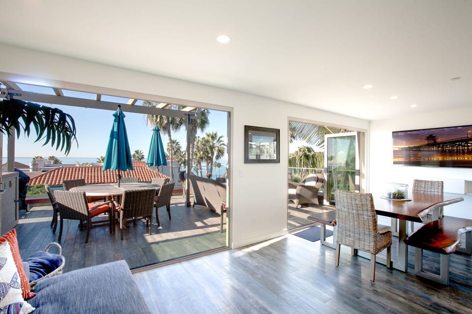 Enjoy the ocean breeze from the dining room, kitchen, family room and 