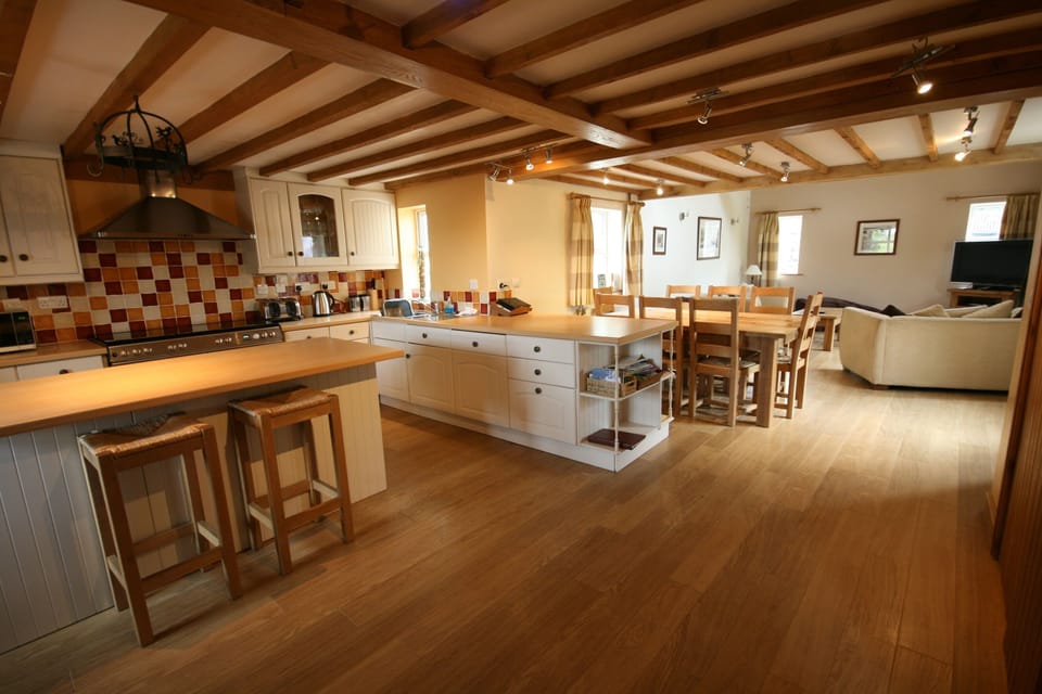 Kitchen, dining area and living room. Spacious and homely.