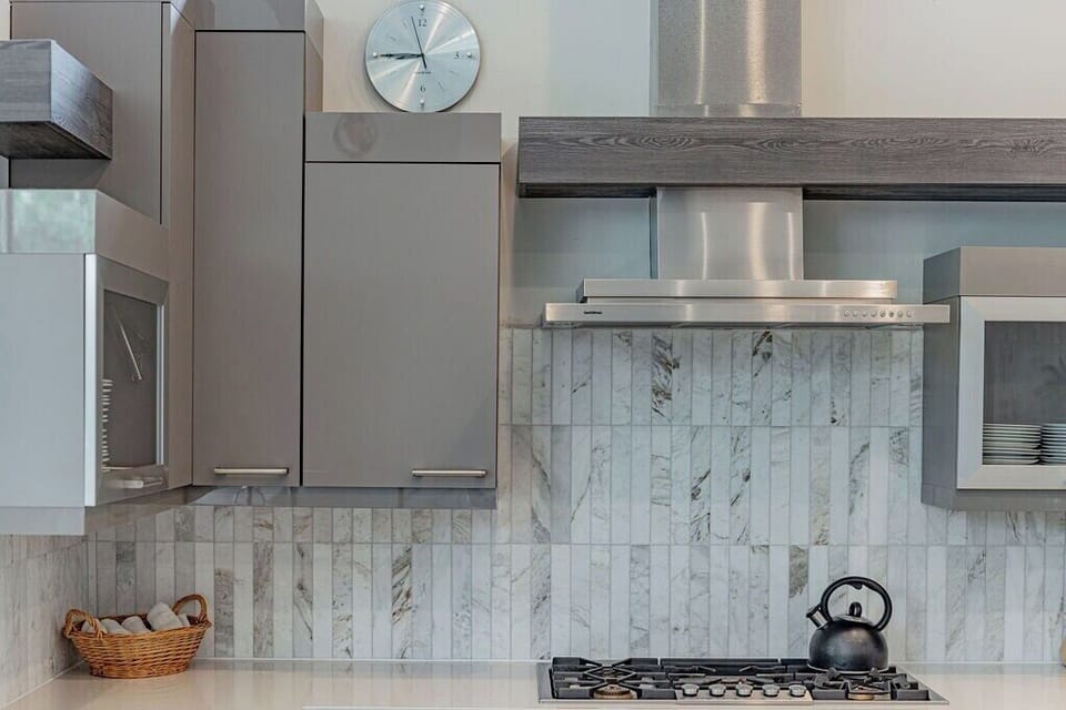 Cooking Range + Hood - Walker Luxury Vacation Rentals