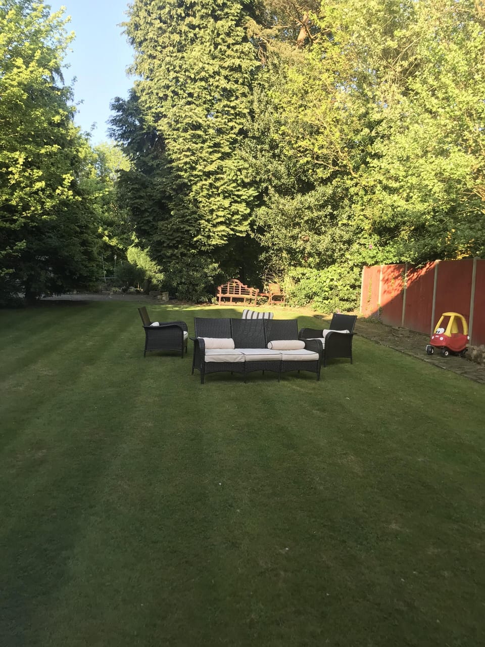 Secluded Rear Garden surrounded by conifer trees. 