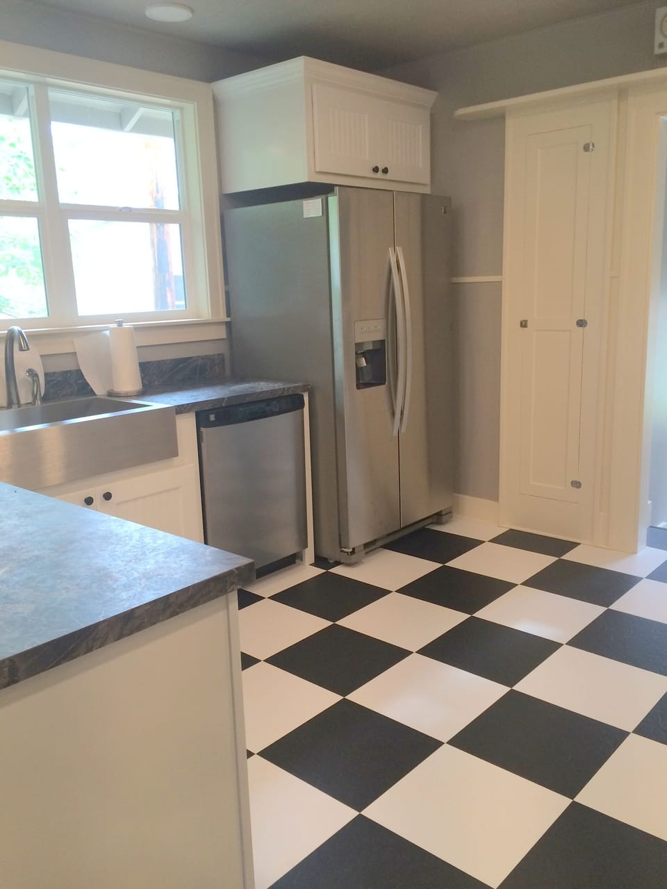 Brand new kitchen renovation with farmhouse sink and all new appliances.