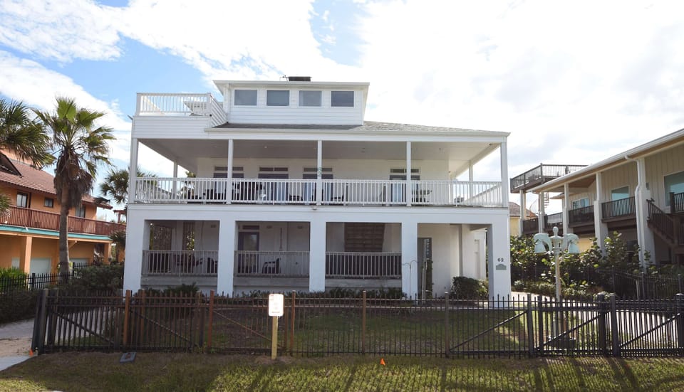 Grand beachfront home with wraparound decks and ocean views