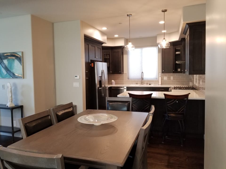 Dinning Table seats 6 and the Kitchen Bar seats 2