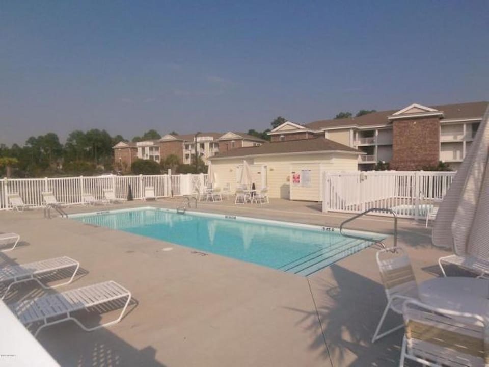 Pool out front of condo, with Charcoal BBQ's