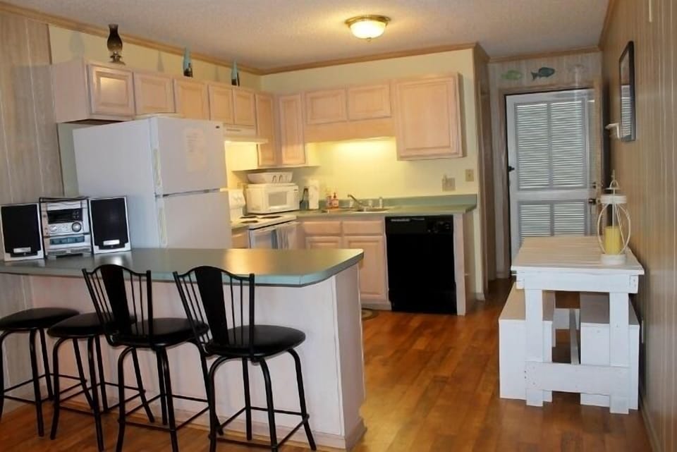 Kitchen that leads into living room