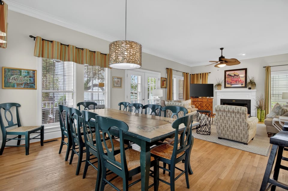 Gather together in this bright, open space where dining and relaxation flow seamlessly. Light-filled comfort invites you to share meals and create lasting memories with loved ones.