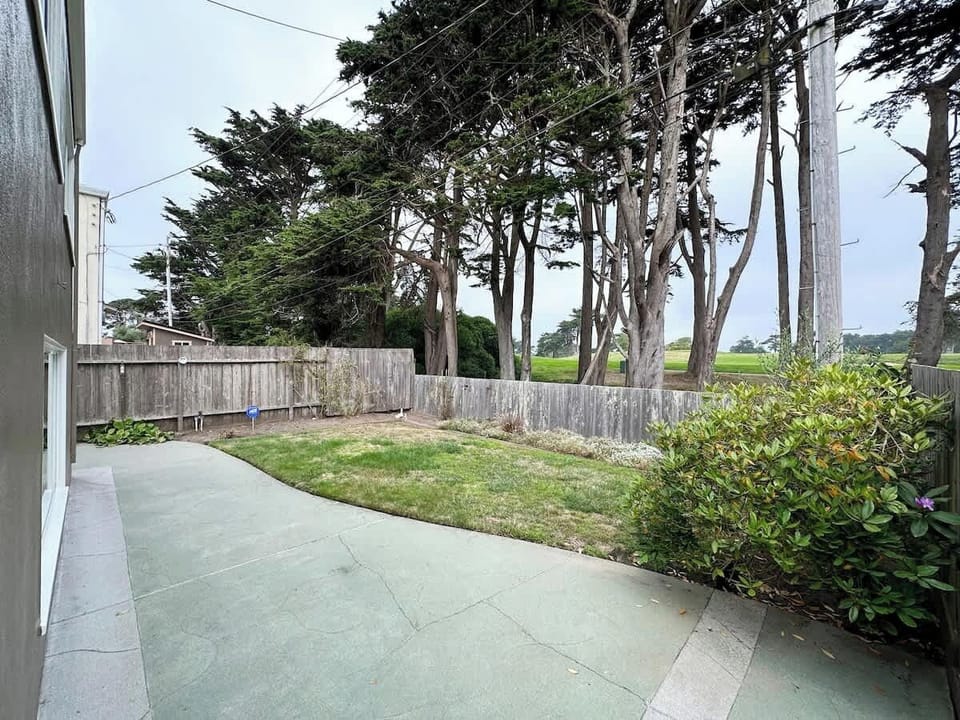 Private backyard with open space and patio—perfect for relaxing outdoors or enjoying fresh air.