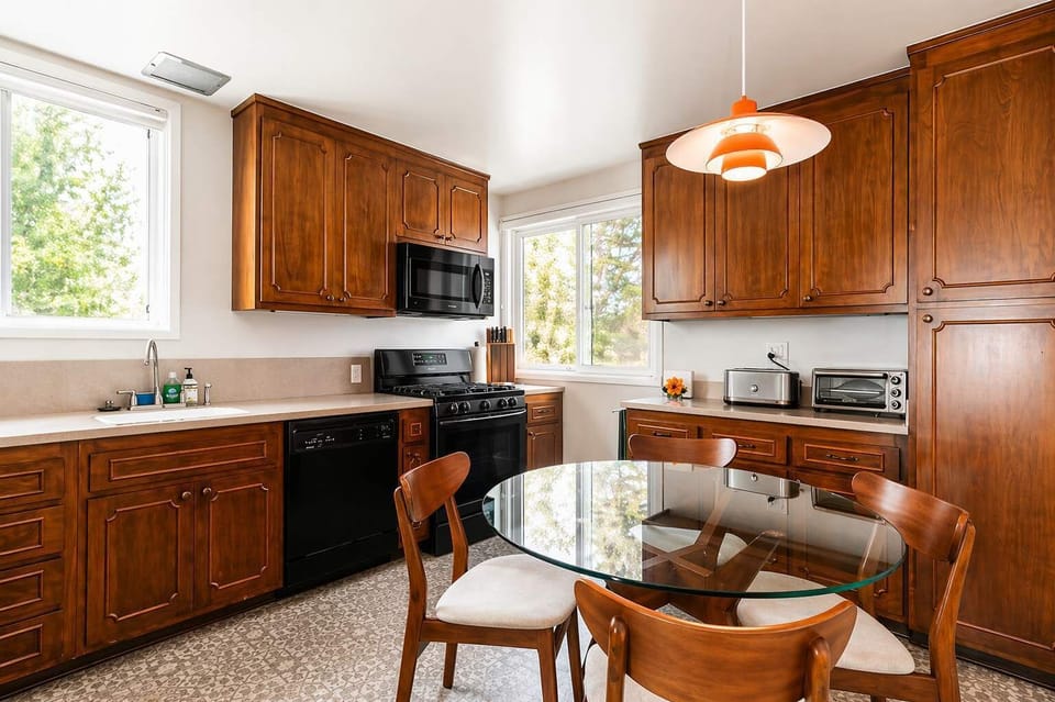 Inviting kitchen space with ample cabinets, natural light, and a cozy table for morning coffee or meals. 🍳✨