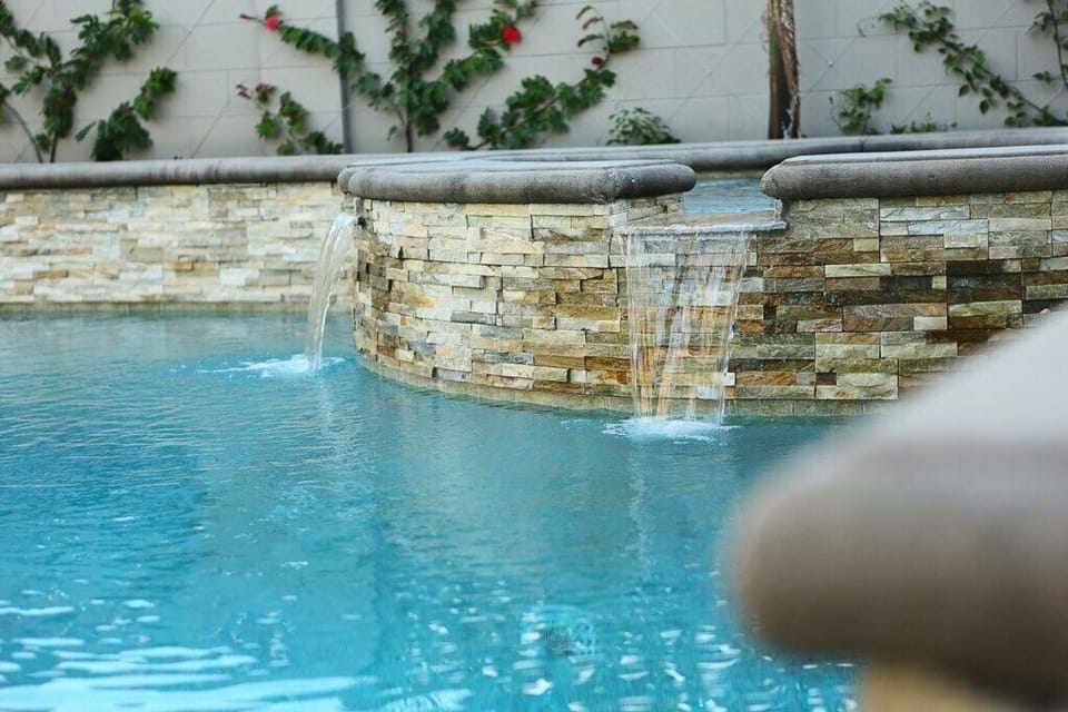 Stunning In-ground Pool and Jacuzzi with Waterfall Feature