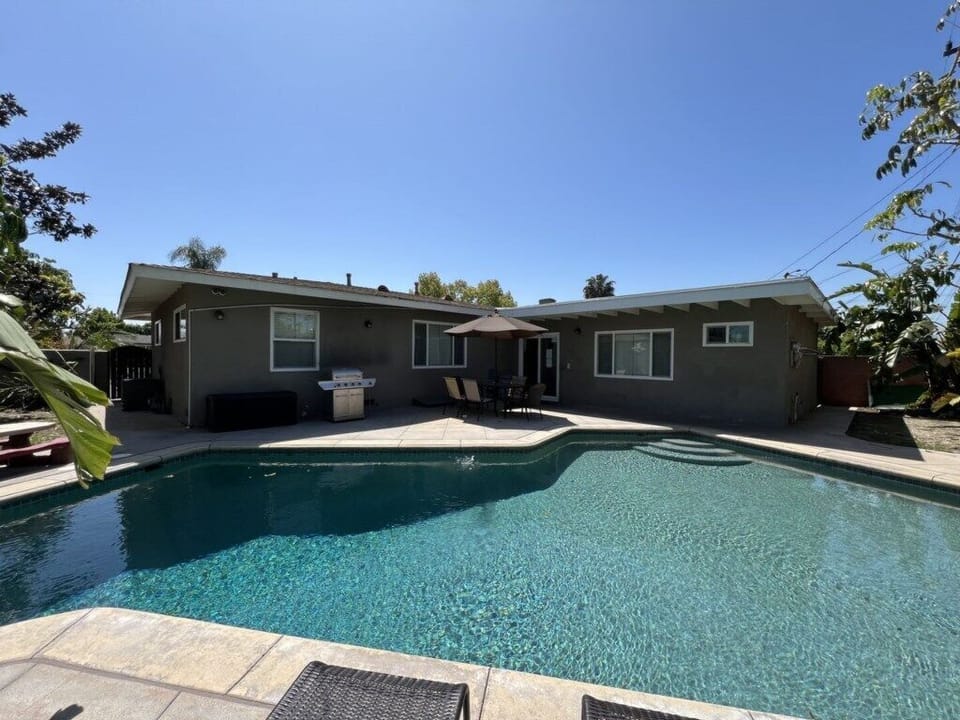 Pebble-Tech In-ground Pool with Outdoor Dining