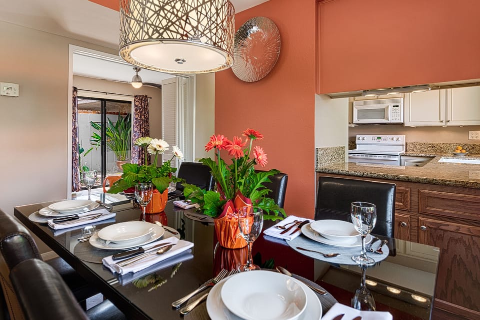 Plenty of dishes, glasses and flatware 