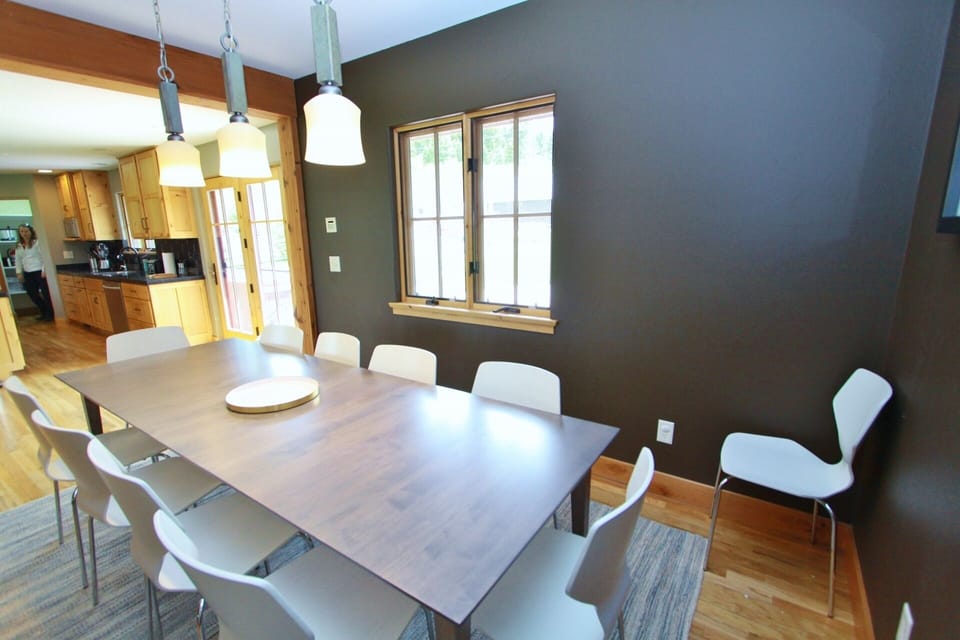 The dining area is adjacent to the kitchen.