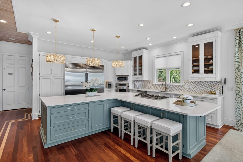 Your dream kitchen awaits with gleaming countertops, premium appliances, and a welcoming island perfect for morning coffee or evening meals.