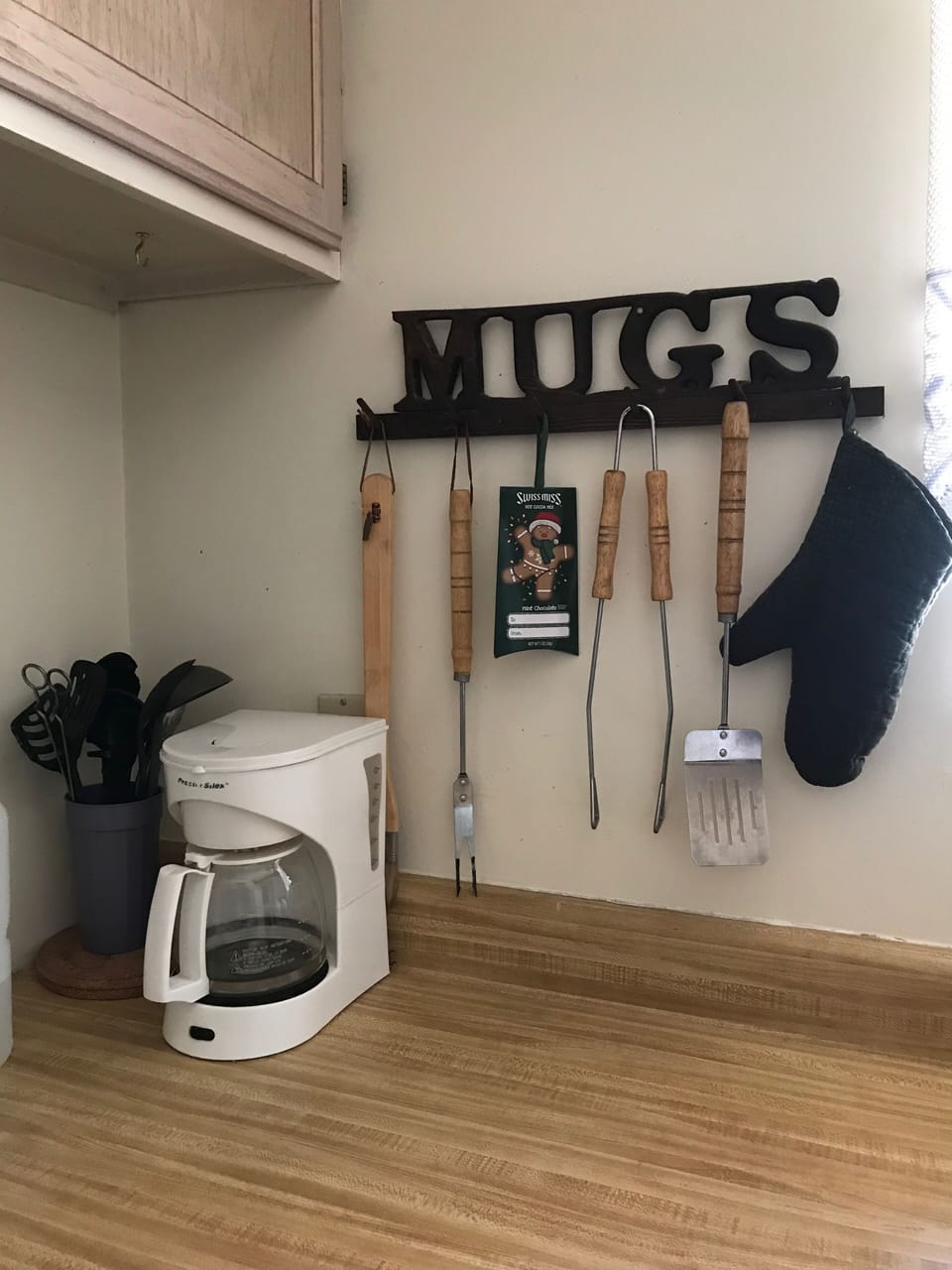 Coffee maker and large kitchen utensils
