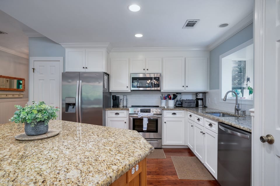 The cabinets are stocked with all the comforts of home.