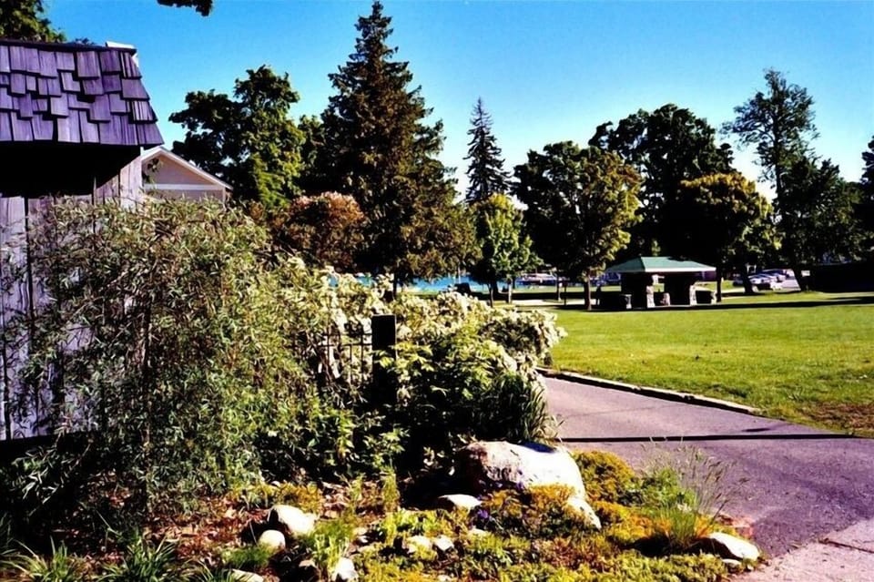 View of park & bay with rock garden in the foreground