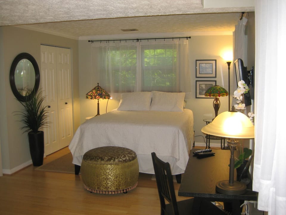 Queen bed with memory foam topper,  double closet. 