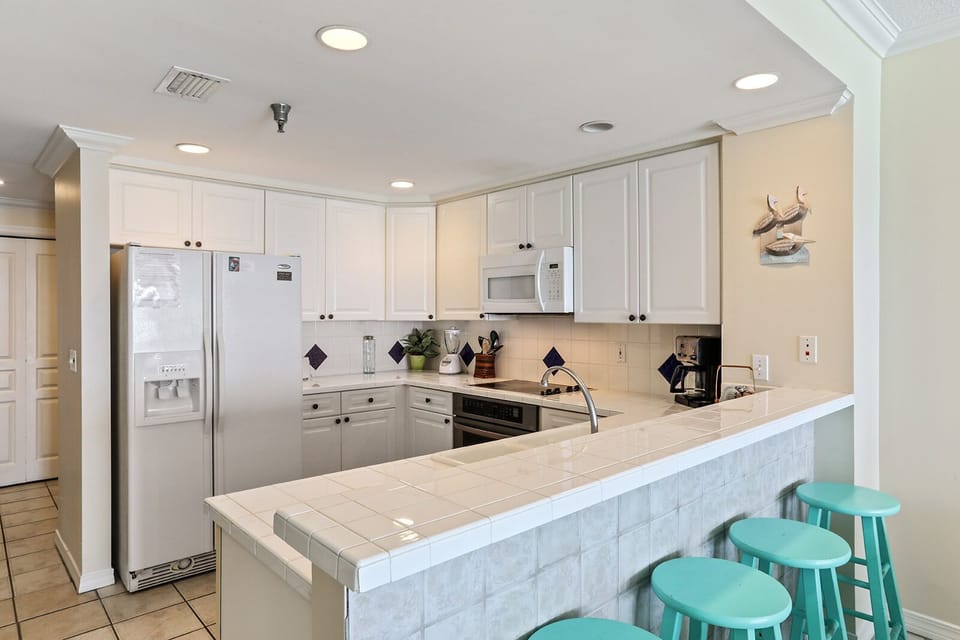 Kitchen fully stocked with cooking essentials  