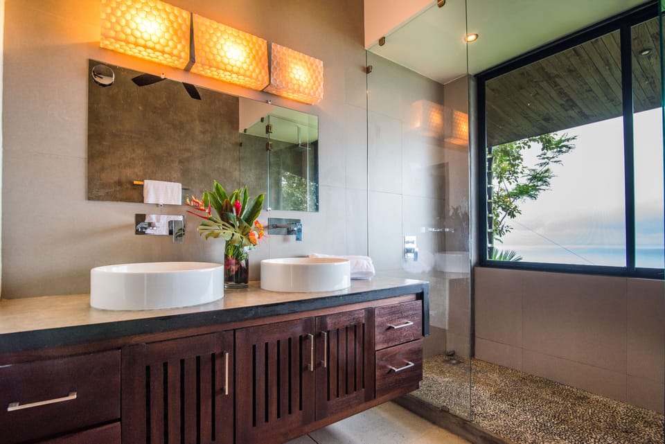 master bathroom with screened in rain shower. an amazing way to start the day!
