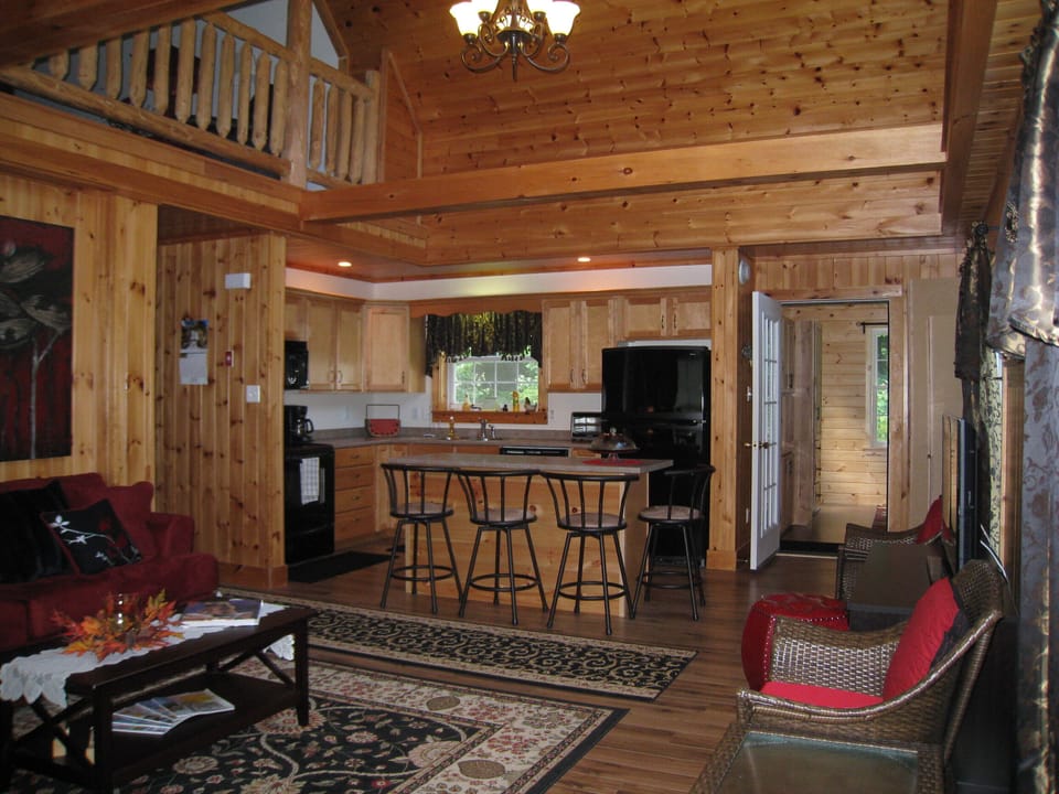 another view of great room looking into kitchen and doorway to dining room