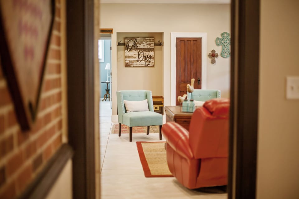 view from the TV room into the living area