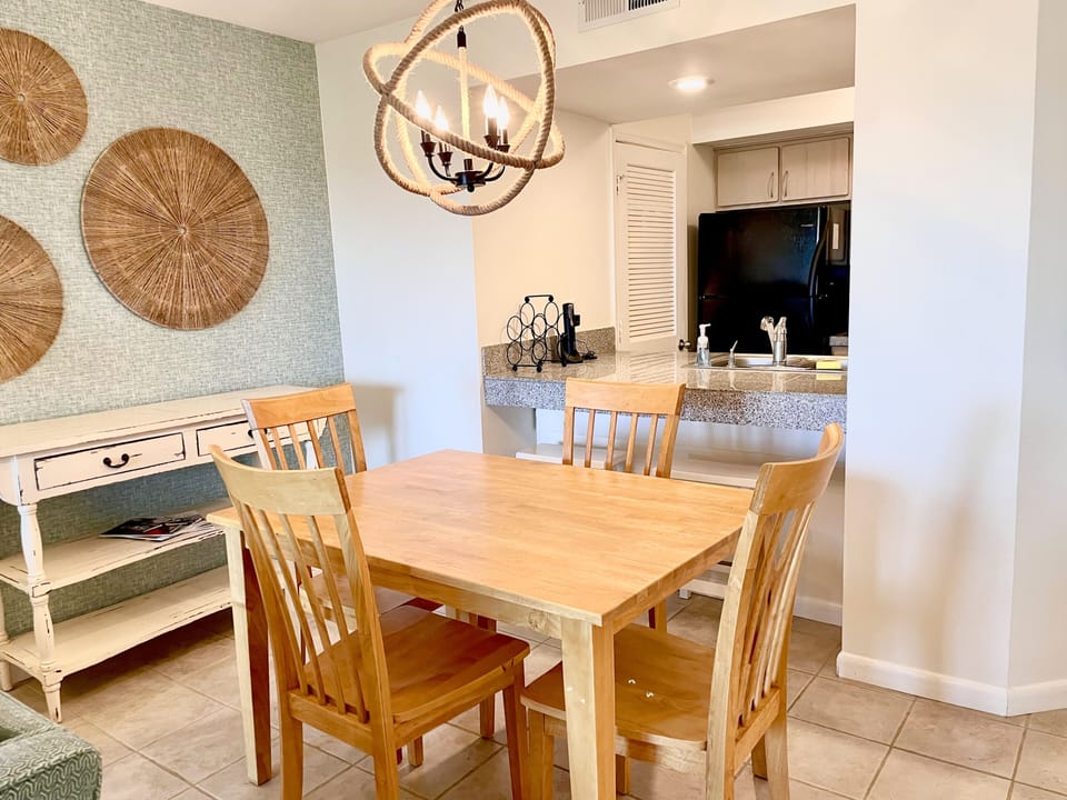 The dining table seats 4 comfortably