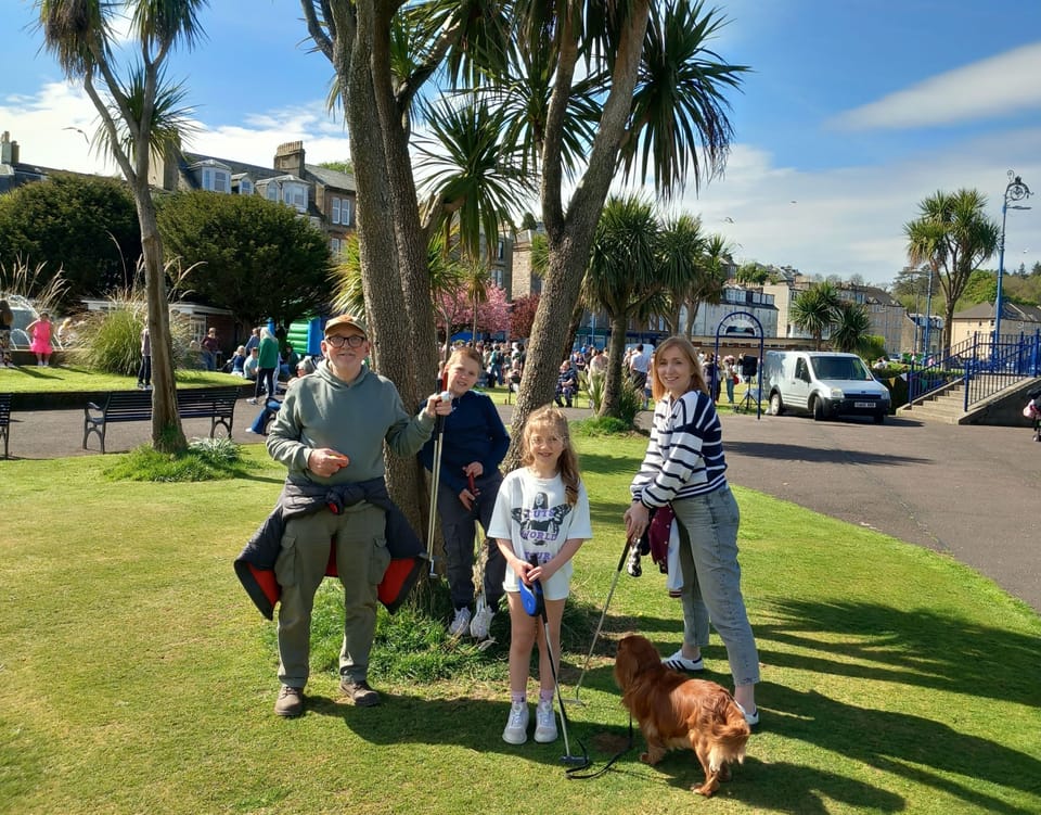 Me with my family at the putting green in Rothesay.  Check out the palm trees.