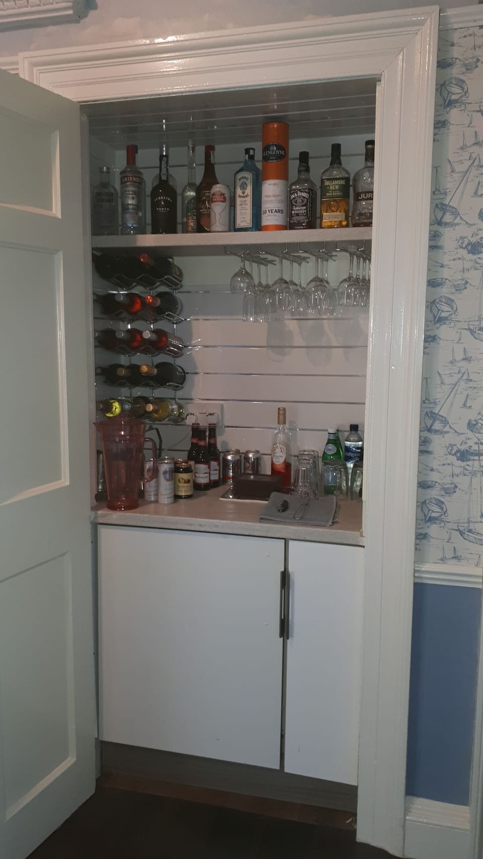 Stocked bar with honesty box